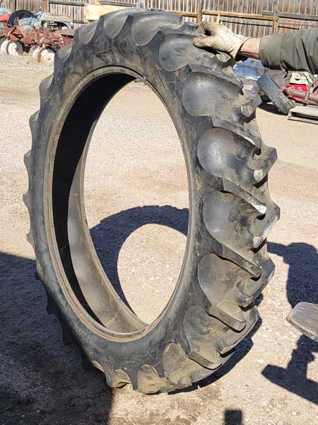 Used - 11.2 x 38 Co-op tractor tire, single tire --- $350