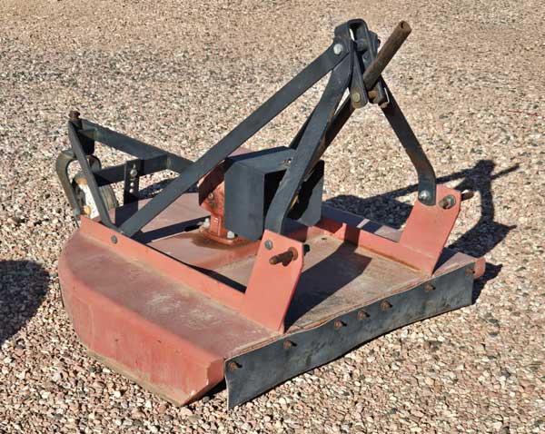 Used --  4 foot rotary mower with complete PTO shaft