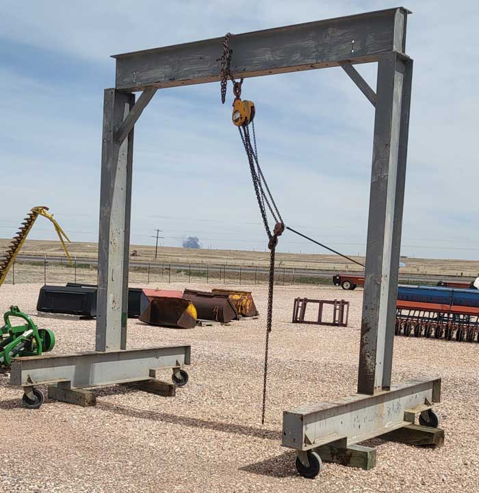 Three ton hoist on rolling frame