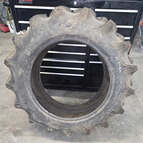 Used - 11.2 x 24 single tire nos, fits many compact and itility tractors --- $300.