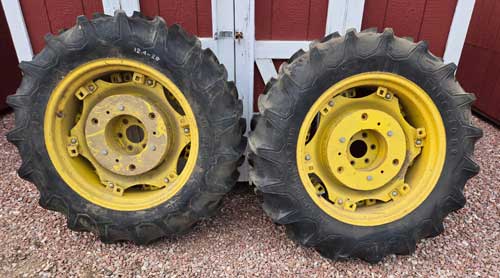 Used - 12.4 x 28 tires, tubes and rims with 6 wheel weights, fits JD and Yanmar compact tractors --- $1,200/pair